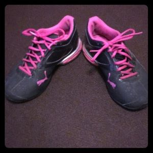 Pink and black puma training shoes